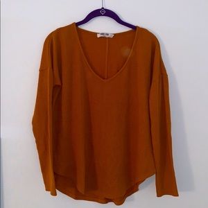 Pumpkin colored long sleeve